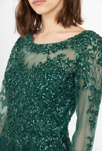 Evening dress with illusion necklace and pleated skirt