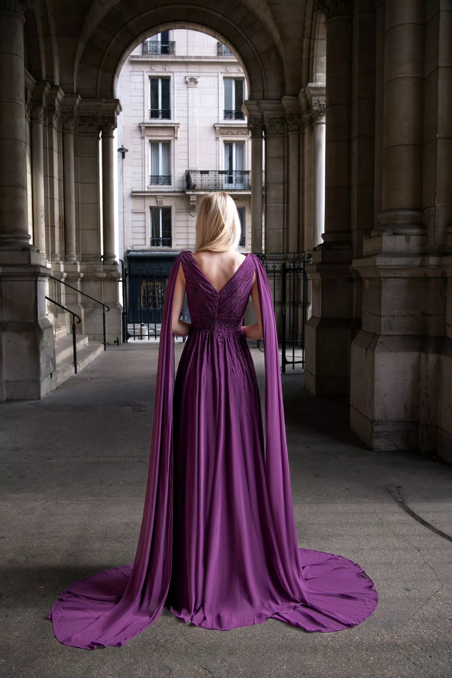 Hand-applied shimmering embroidery flowing silhouette