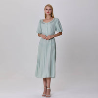 Pleated and embroidered shirt dress