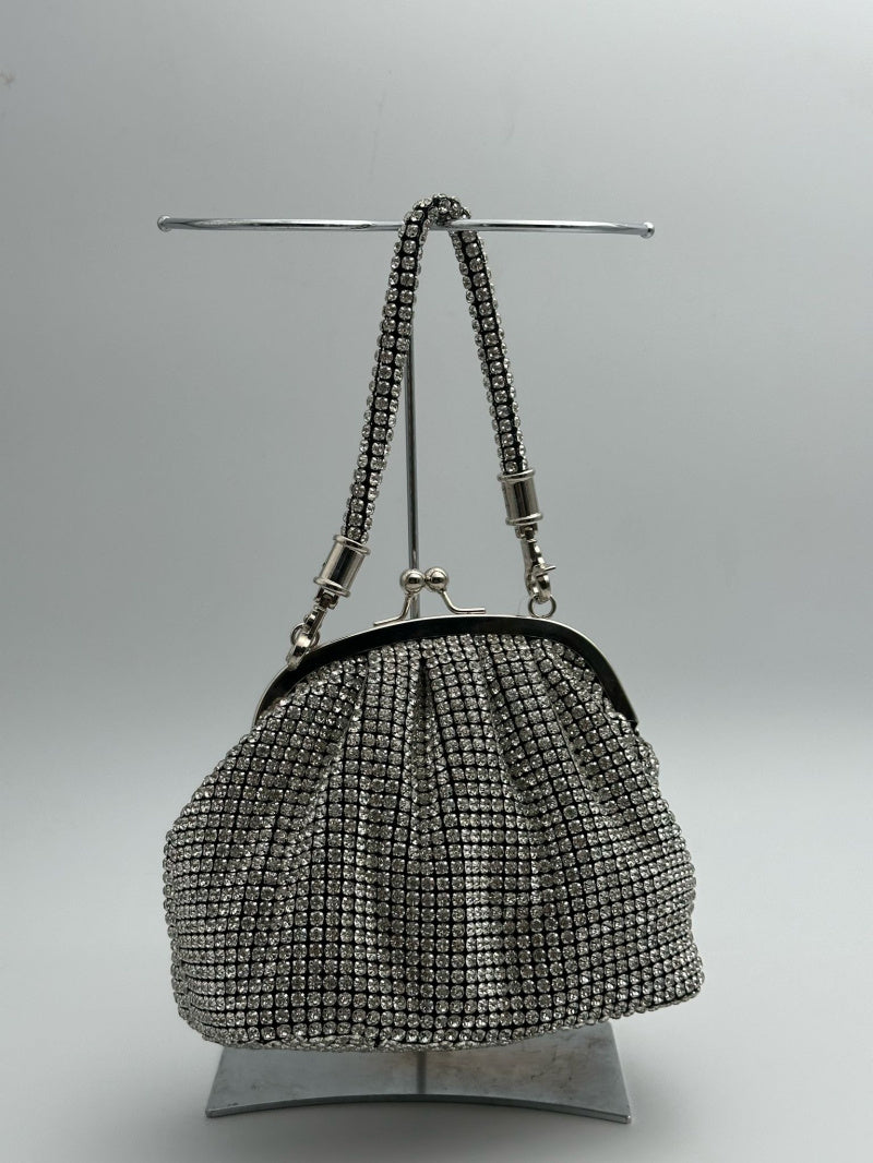 Sparkling mini bag decorated with stones and a buckle